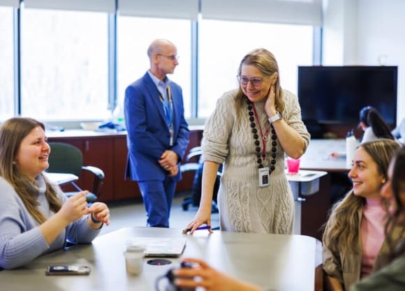 Professor Maya Doyle leads an Interprofessional Healthcare Education workshop with students.