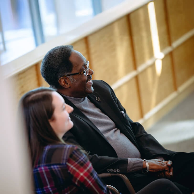 Two professional individuals partake in a critical conversations workshop.