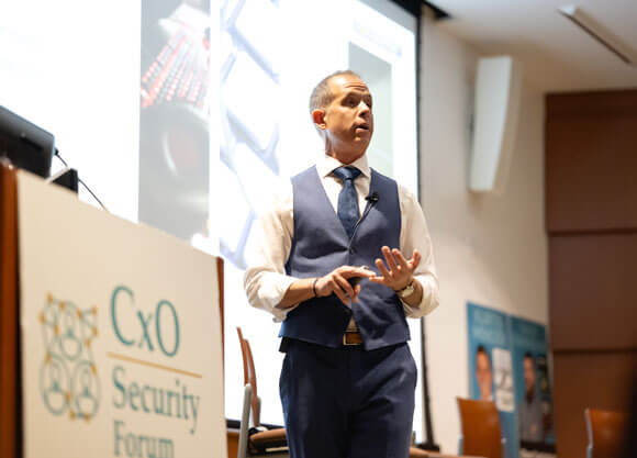 Speaker presents on stage